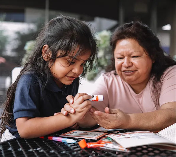 Mother and daughter playing with the uniqueverse kit together